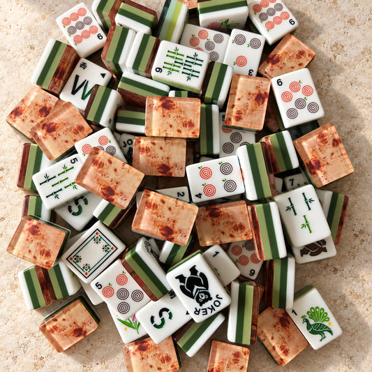Copper Grove Mahjong tiles scattered with warm woodgrain-effect backs