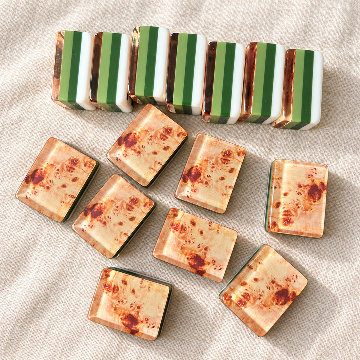 Close-up of Copper Grove woodgrain-effect tile backs and green striped sides