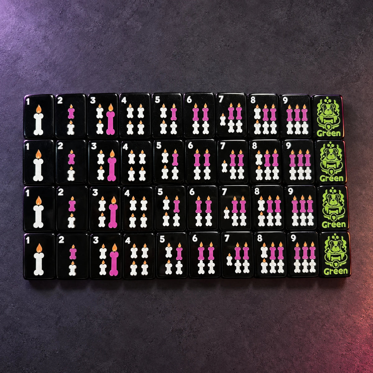 Black bamboo suit Mahjong tiles reimagined as bone-shaped candles with a green bulldog dragon tile
